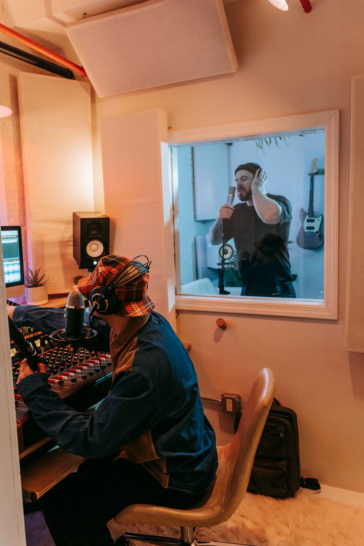 Musicians collaborating during a recording session